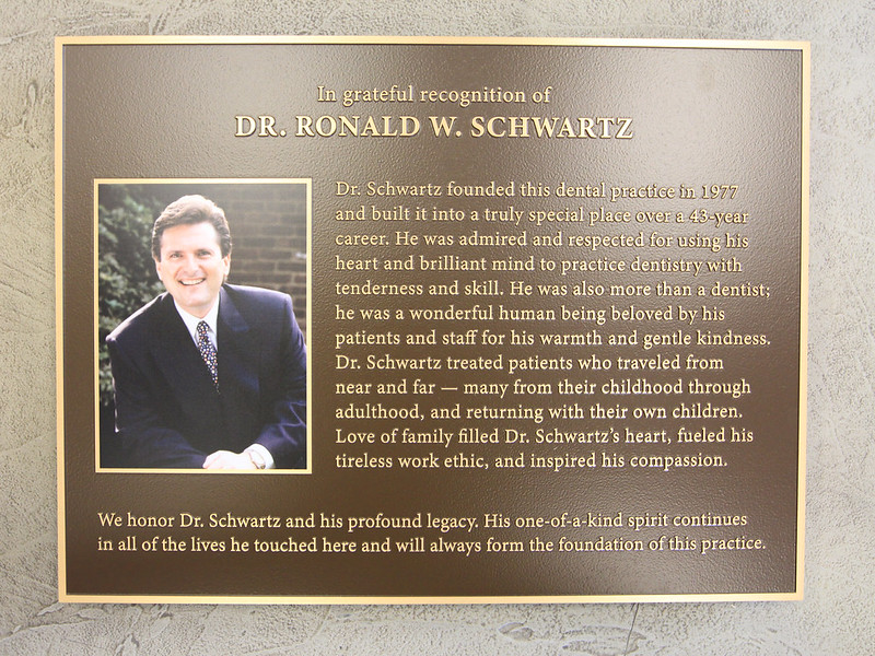 Bronze memorial plaque with color photo
