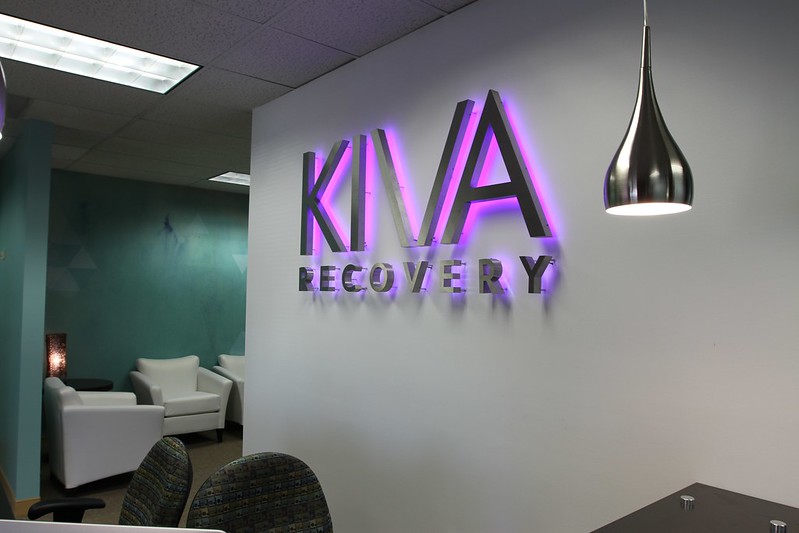 Backlit office lobby signs in Kiva medical office