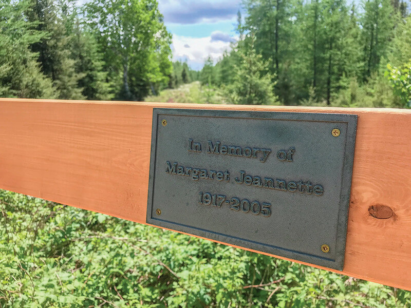 Memorial plaque at a scenic overlook 