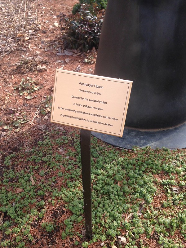 Bronze plaque mounted on a post