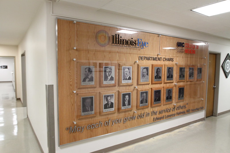 Acrylic plaque in a hospital featuring department chairs