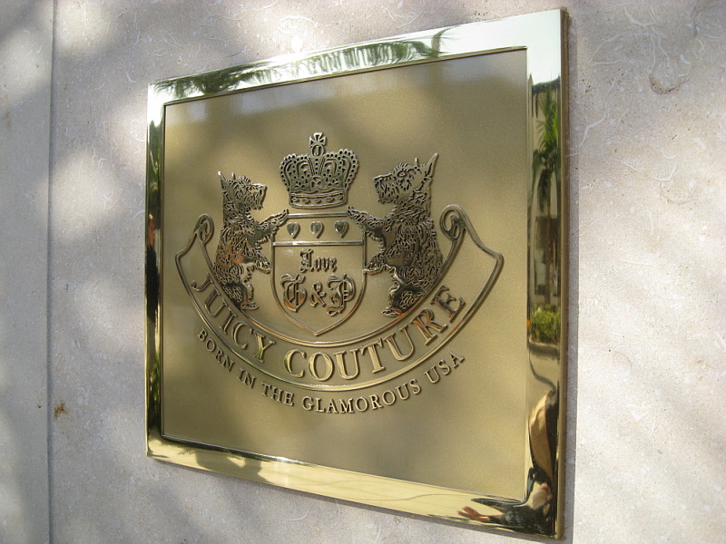 Wall-mounted brass plaque.