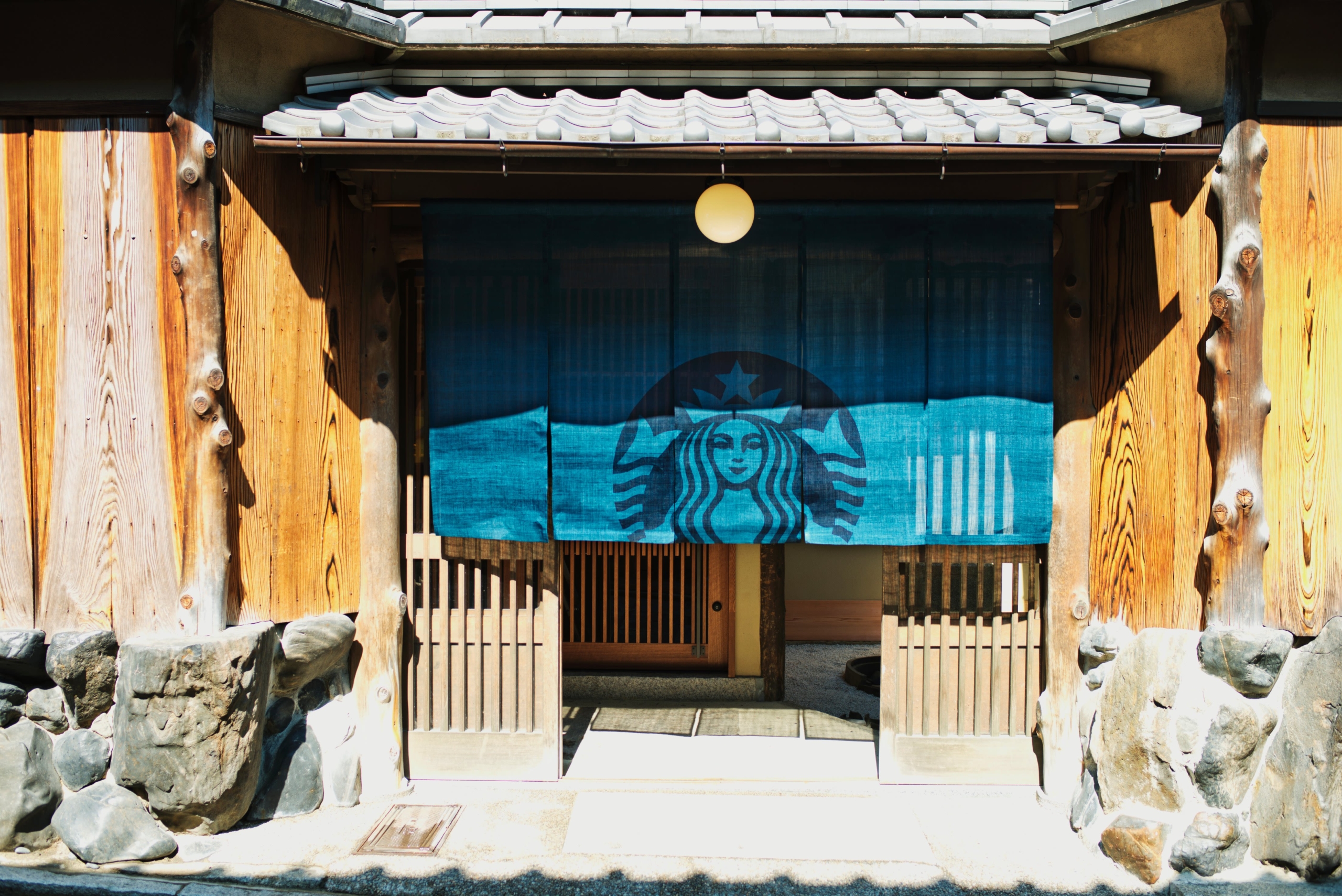 Starbucks revamping their exterior architecture to blend with the local aesthetic. Source | CNN