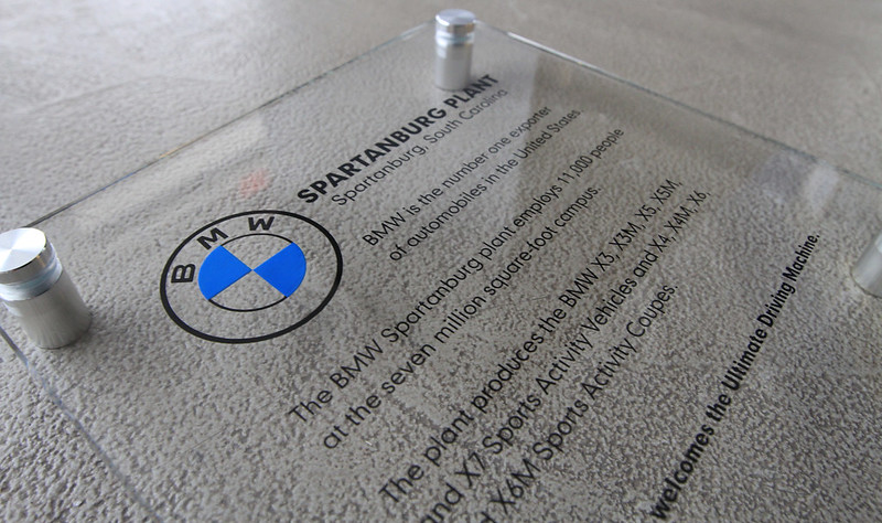 Glass plaque for an automotive plant location.